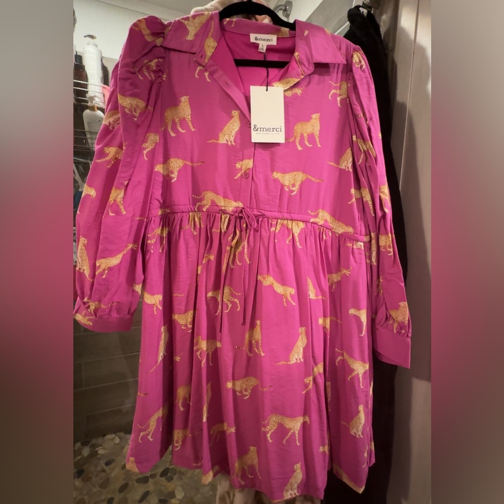 Pink dress with cheetahs. cuff sleeves